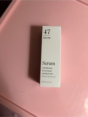 Skin Serum in Pink and White Box